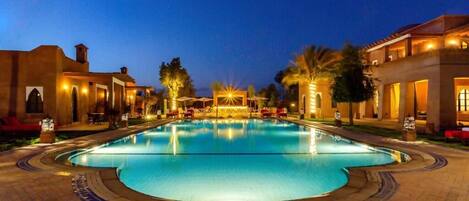 Outdoor pool, pool umbrellas, sun loungers