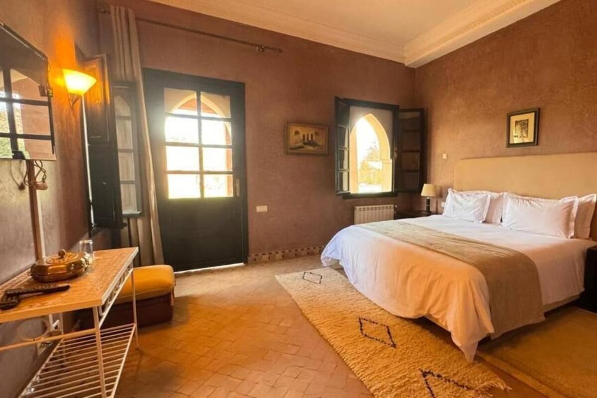 Phòng đôi Deluxe, quang cảnh vườn | Két bảo mật tại phòng, màn/rèm cản sáng