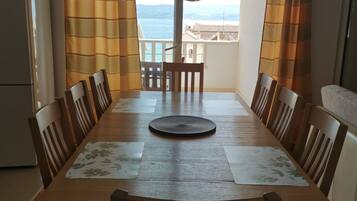 Apartment (Three Bedroom Apartment with Terrace ) | Living room | 32-inch flat-screen TV with cable channels