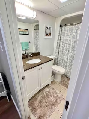 Hair dryer, towels, soap, toilet paper