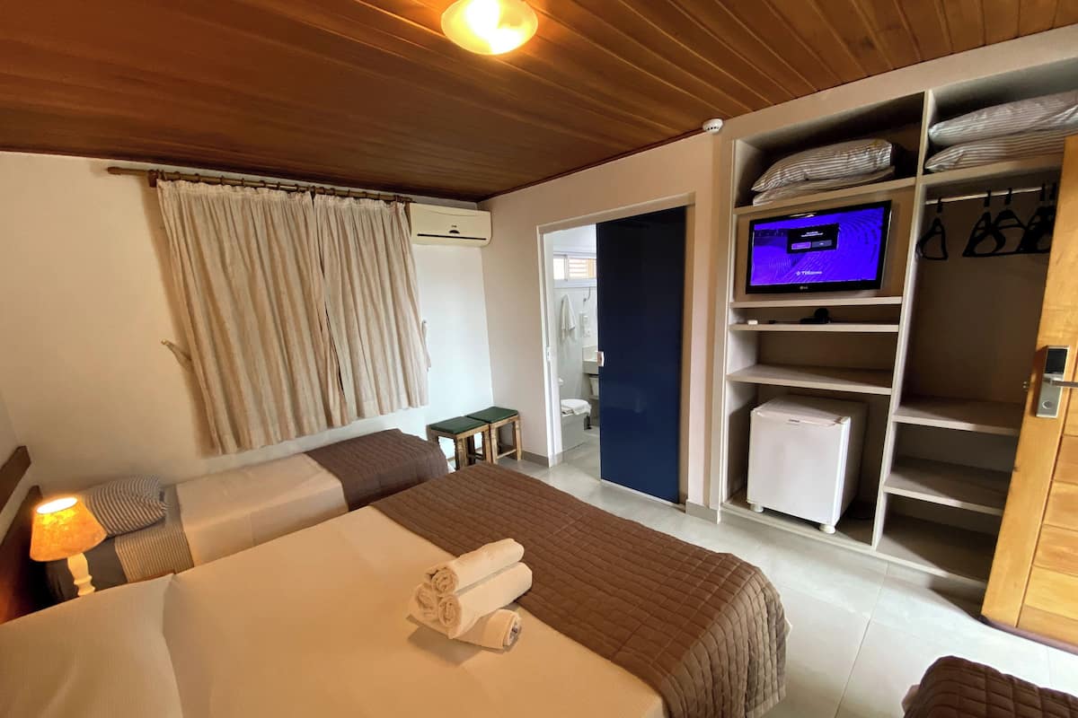 Standard Quadruple Room | Minibar, in-room safe, blackout drapes, WiFi (free)