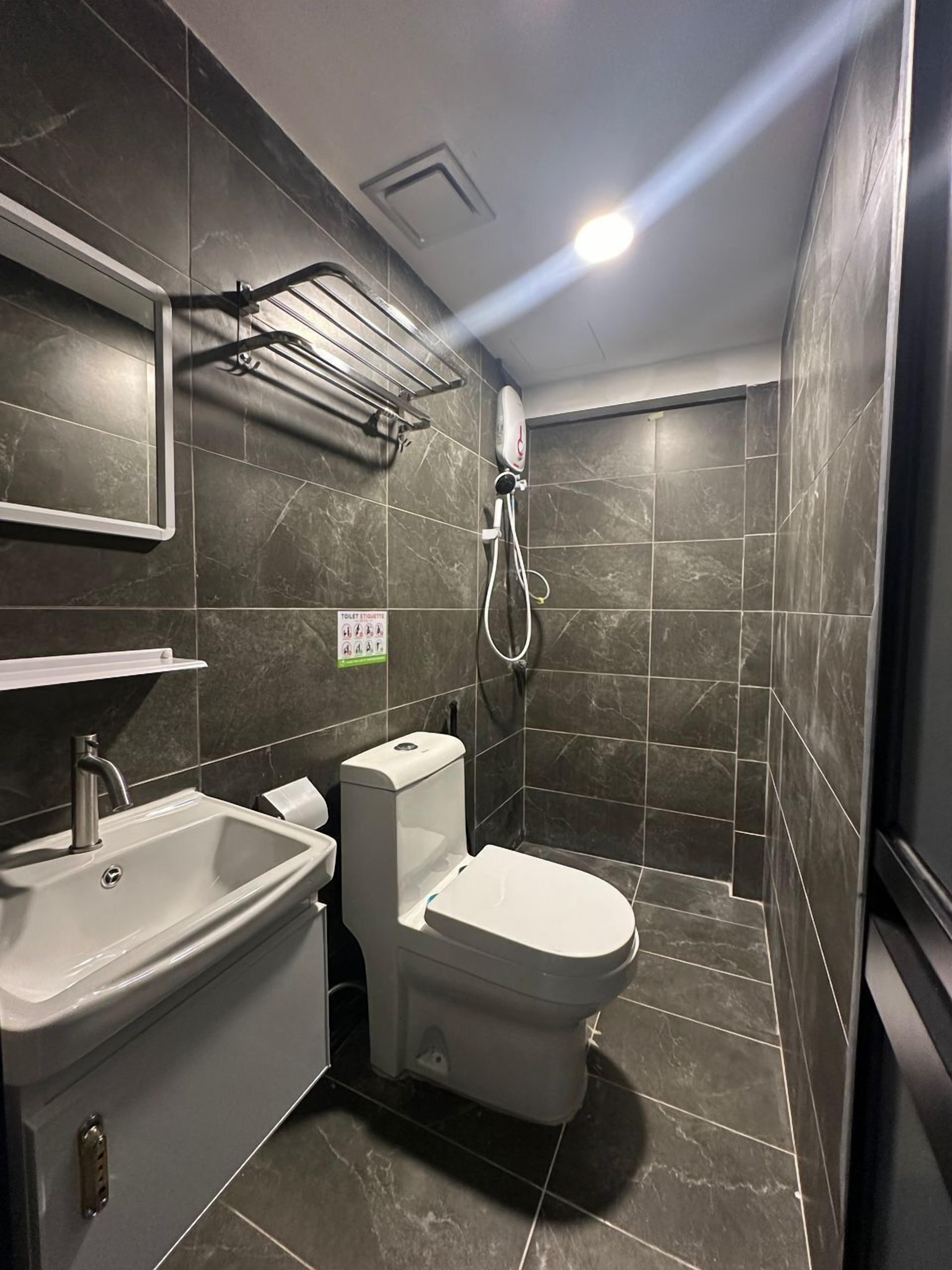 Shower, free toiletries, hair dryer, slippers