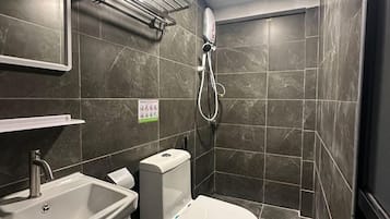 Shower, free toiletries, hair dryer, slippers