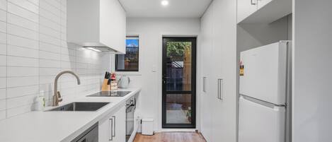 Fridge, microwave, dishwasher, cookware/dishes/utensils