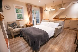 1 bedroom, desk, iron/ironing board, travel cot