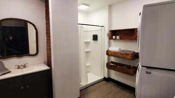 Shower, hair dryer, towels, soap