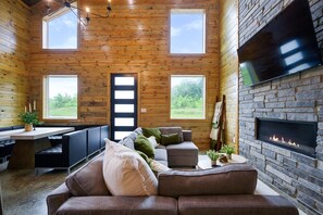 Cabin, Multiple Beds, Hot Tub, Garden View (Bearly Creekin') | Living area | 55-inch flat-screen TV with digital channels, fireplace - Bearly Creekin' Stay for 14! (Broken Bow)