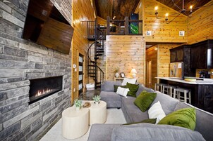 Cabin, Multiple Beds, Hot Tub, Garden View (Bearly Creekin') | Living area | 55-inch flat-screen TV with digital channels, fireplace