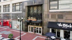 A building with a storefront named 'The Block' featuring a black awning and a glass entrance. - Ste 404 Center of Downtown-Skywalk Access to Convention Center+Free Parking (Indianapolis)