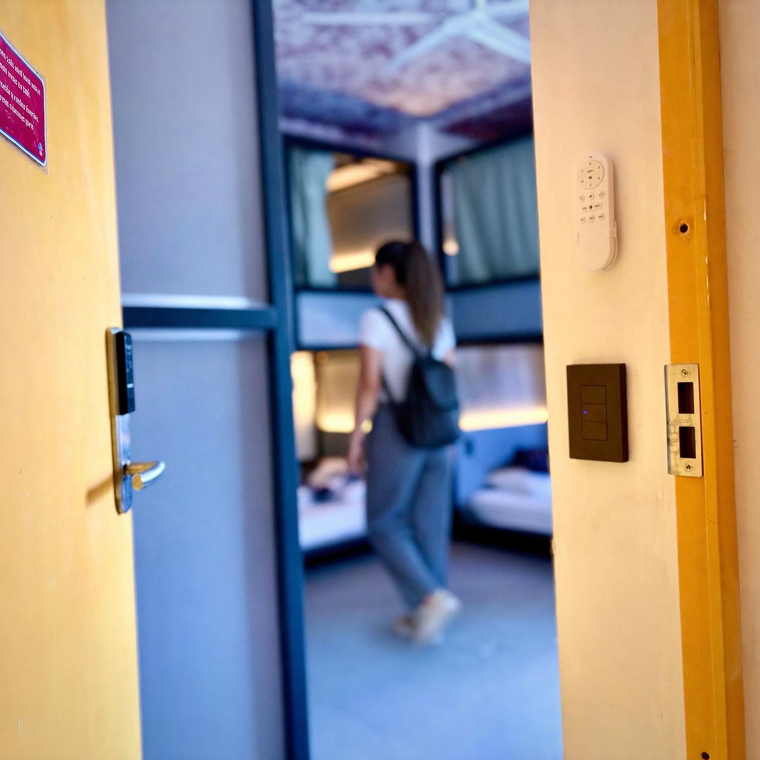 Habitación Compartida Mujeres 8p (Amarila) | Desk, laptop workspace, blackout drapes, iron/ironing board