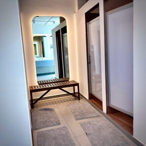 Hair dryer, towels, soap, shampoo