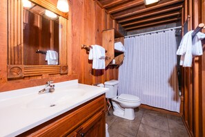 Jetted bath, hair dryer, towels, soap