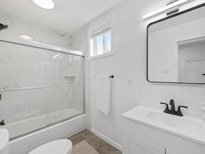 Hair dryer, towels, soap, shampoo