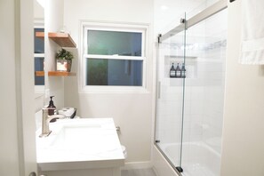 Shower, eco-friendly toiletries, hair dryer, bidet