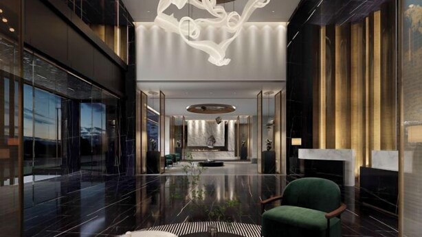 A spacious lobby with a modern chandelier, a fireplace, and a green armchair. - Stone Hotel (Kaili Downtown Wanda Plaza) (Kaili)