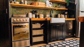 Microwave, stovetop, coffee/tea maker, cookware/dishes/utensils