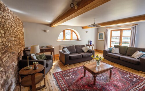 Gorgeous spacious converted barn perfect for families with large garden.