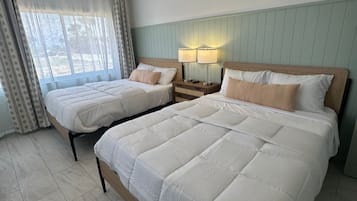 Suite, varias camas, cocina, vistas a la playa | Wifi gratis