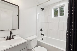 Hair dryer, towels, soap, shampoo