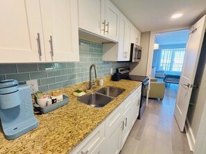 Fridge, microwave, oven, stovetop - Beach'n 8th Floor 1BR Condo Ocean Front (Myrtle Beach)