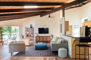 TV, fireplace, books, offices