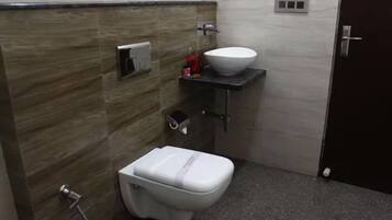 Shower, towels, soap, toilet paper