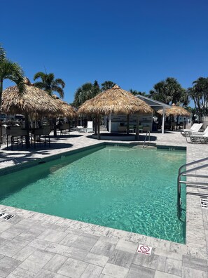 Outdoor pool, a heated pool - On Golden Pond 1-bedroom home overlooking pond in Punta Gorda,  FL (Punta Gorda)