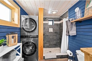 Hair dryer, towels, soap, toilet paper