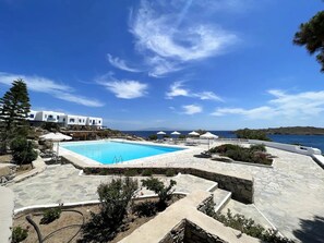 Seasonal outdoor pool, pool umbrellas, sun loungers