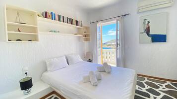 Premium Condo, Kitchen, Sea View | Iron/ironing board, free WiFi