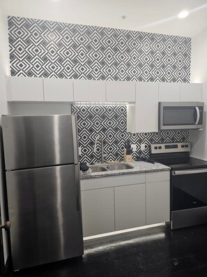 Private kitchen - Charming and unique upscale 1-bedroom apartment in downtown Okmulgee (Okmulgee)