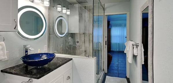 Shower, hair dryer, towels, soap