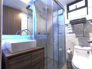 Shower, hair dryer, towels, soap