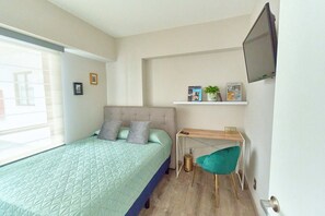 2 habitaciones, tabla de planchar con plancha, wifi y ropa de cama 