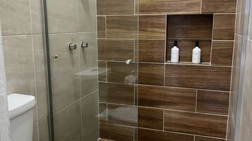 Shower, towels, soap, shampoo