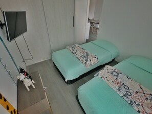 2 slaapkamers, een strijkplank/strijkijzer, wifi, beddengoed