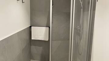 Eco-friendly toiletries, hair dryer, towels