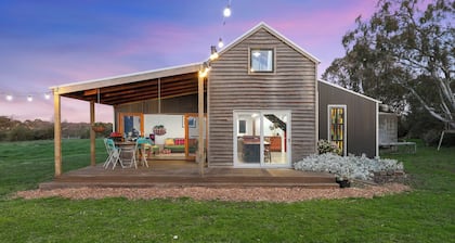 Cozy cabin in peaceful Wangoom with AC, WiFi
