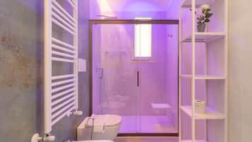 Regadera, secadora de cabello, toallas