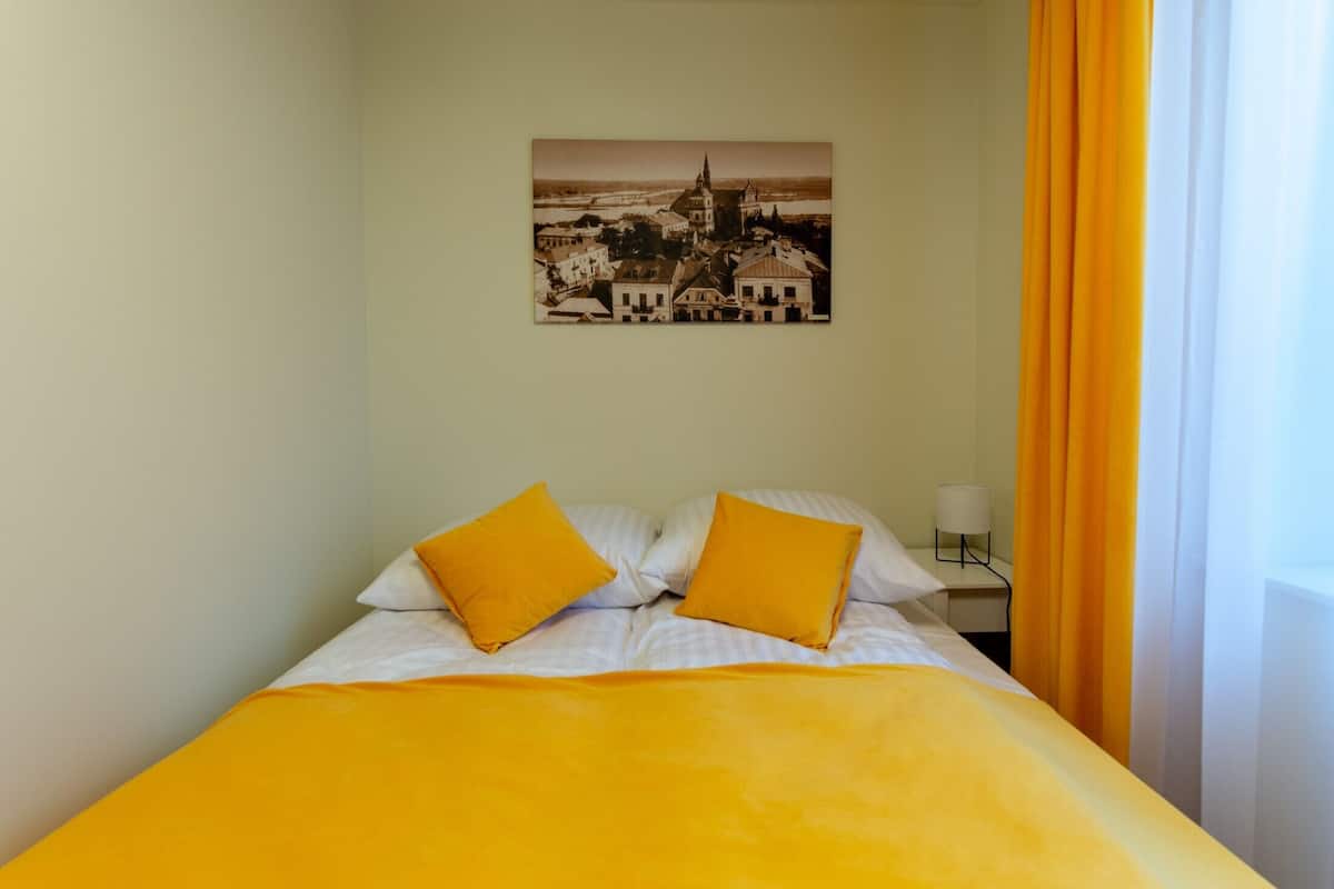 Comfort Room, City View | Desk, laptop workspace, iron/ironing board, free WiFi