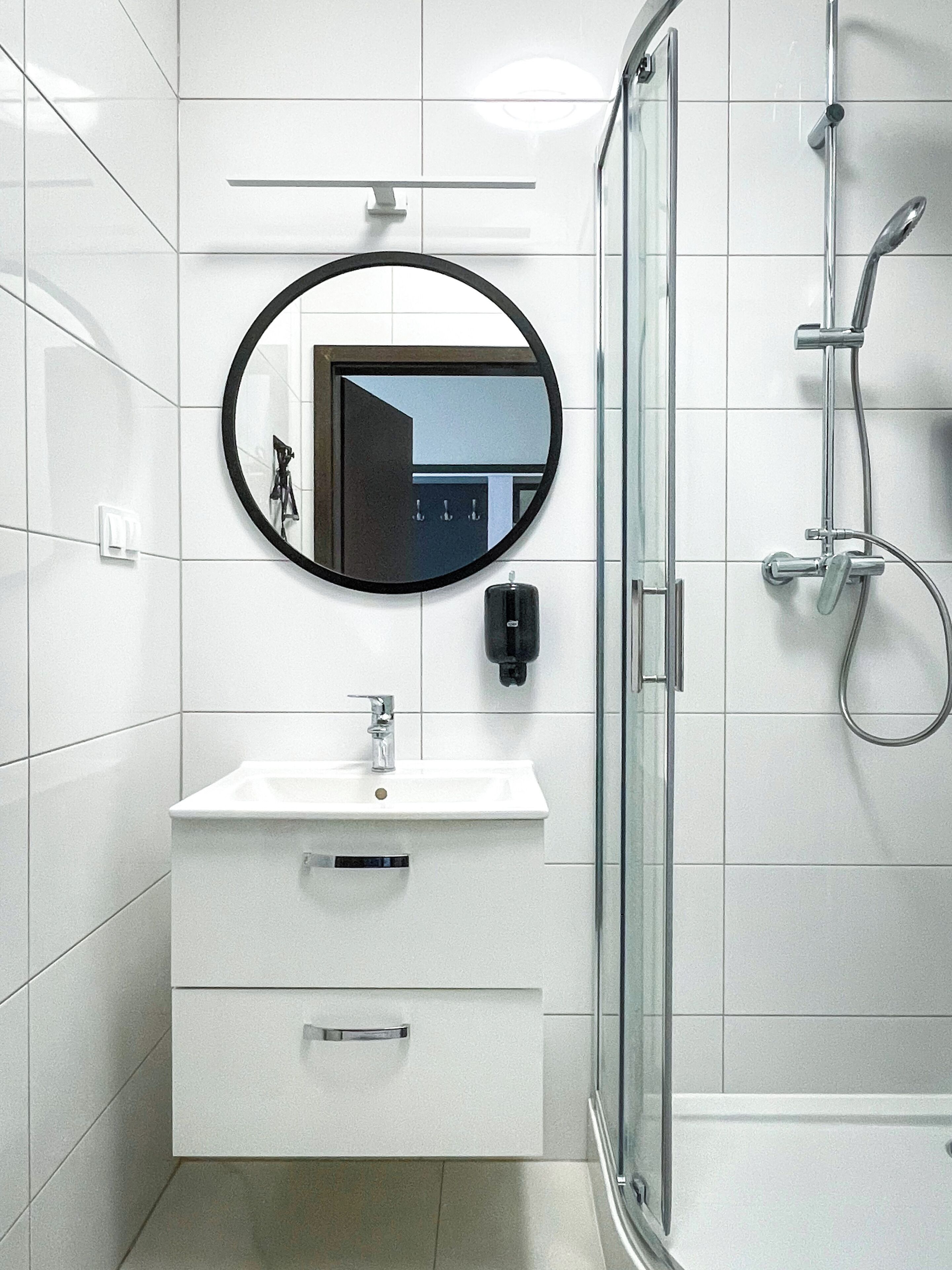 Shower, hair dryer, towels, toilet paper