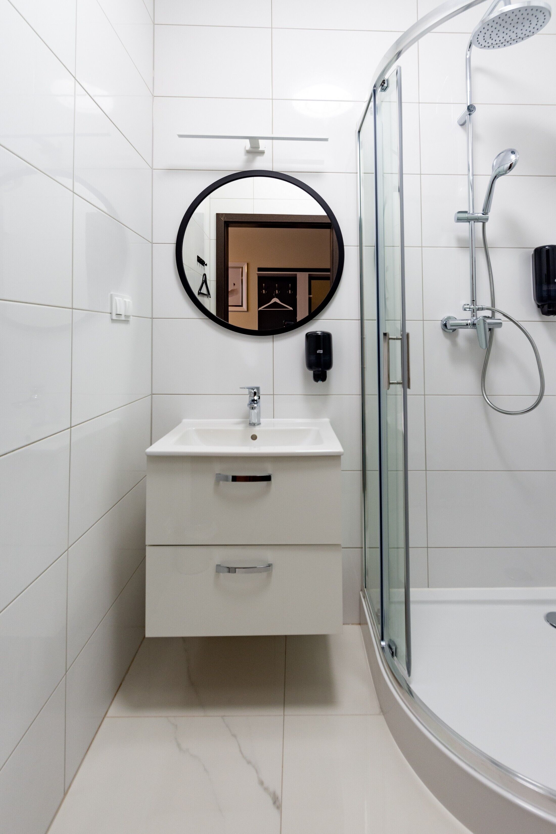 Comfort Room, City View | Bathroom | Shower, hair dryer, towels, toilet paper