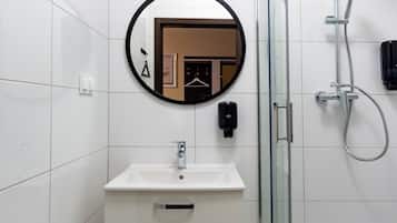 Comfort Room, City View | Bathroom | Shower, hair dryer, towels, toilet paper
