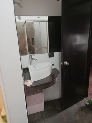 Shower, towels, soap, toilet paper