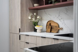 Deluxe Apartment, 3 Bedrooms, Balcony, City View | Private kitchen | Coffee/tea maker, electric kettle - Refined & Spacious 3-Bedroom Flat Near Cismigiu, Balcony with Boulevard Views (Bucharest)