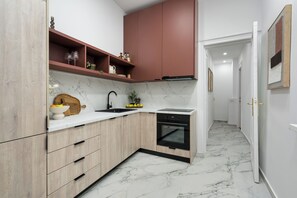 Deluxe Apartment, 3 Bedrooms, Balcony, City View | Private kitchen | Coffee/tea maker, electric kettle