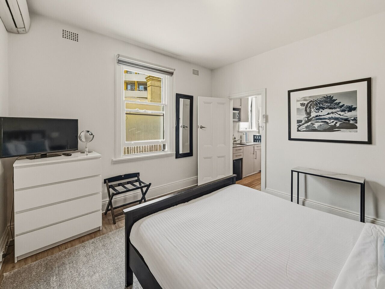 1 bedroom, desk, iron/ironing board, travel crib