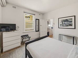 1 bedroom, desk, iron/ironing board, travel cot