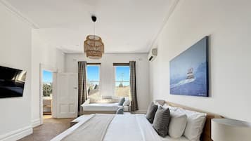 1 bedroom, desk, iron/ironing board, travel crib