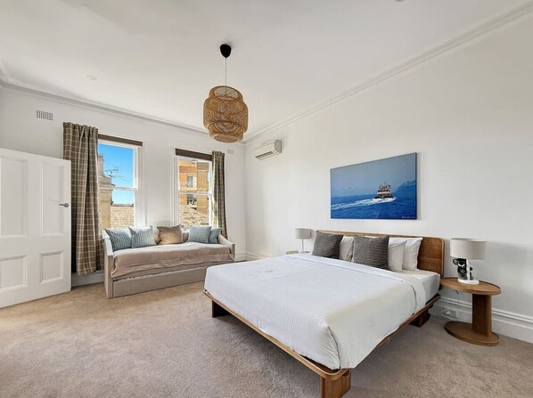 1 bedroom, desk, iron/ironing board, travel crib